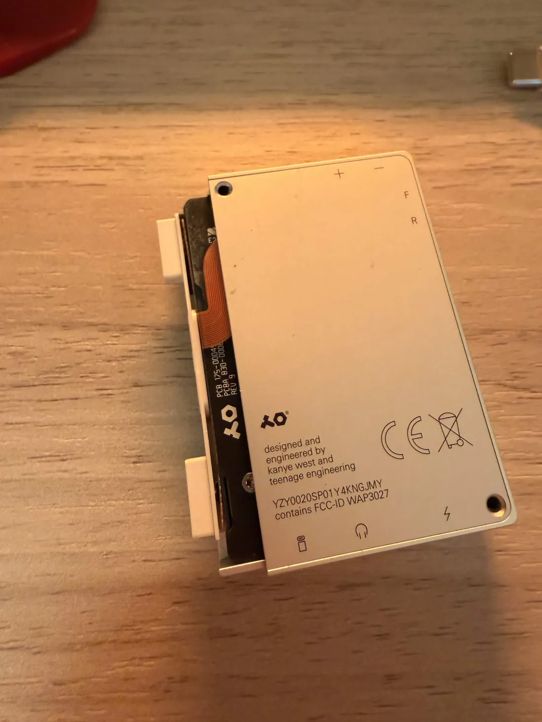 The SP-1 back screw plate with TE logo and serial